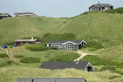 a group of houses on top of a hill at LK552-Lokken-Ornegaardsvej-14 in Løkken