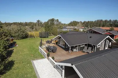 an aerial view of a house with a deck at LK1804-Lokken-Kristavej-43 in Løkken
