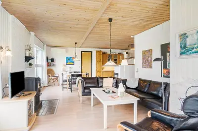 a living room with a couch and a table at LK561-Lokken-Lisbethsvej-1 in Løkken