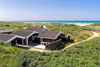 an aerial view of a house on the beach at LK1790-Lokken-Gronhoj-Strandvej-174 in Løkken