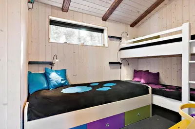 a bedroom with a bunk bed and a bunk bed at LK741-Lokken-Madsinesvej-1 in Løkken