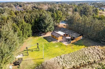 an aerial view of a house in the woods at LK741-Lokken-Madsinesvej-1 in Løkken