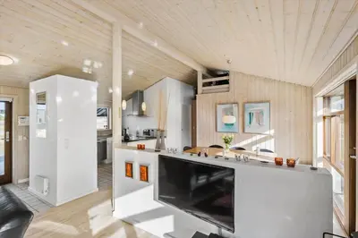 a kitchen with a large island in a room at LK537-Lokken-Mievej-20 in Løkken