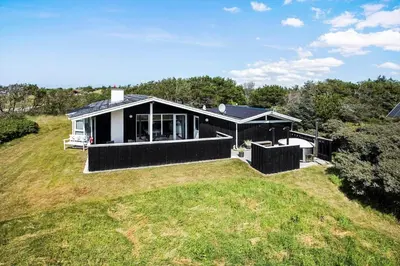 a house on top of a grassy field at LK1779-Lokken-Lydiavej-2 in Løkken