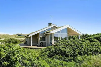 a house on the beach with bushes at LK1716-Lokken-Marthasvej-28 in Løkken