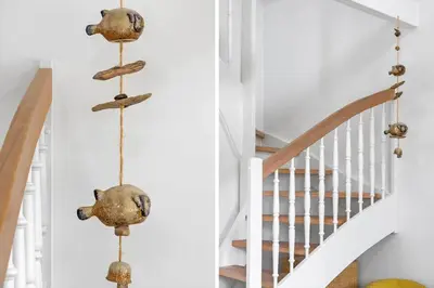 a house with a coastal look with driftwood and stairs at BL1478-Blokhus-Ferren-Syd-152 in Blokhus