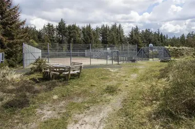 a park with a picnic table and a playground at BL1478-Blokhus-Ferren-Syd-152 in Blokhus