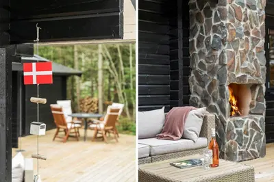a fireplace and a patio with a couch and a table at BL1224-Saltum-Vikingebanke-7 in Saltum