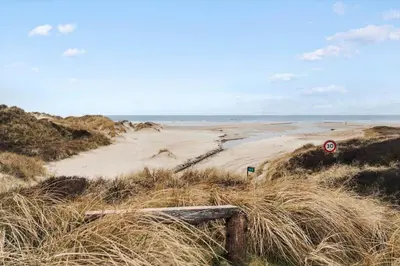 a dirt road leading to the ocean on a beach at BL1241-Saltum-Bondagervej-2 in Saltum
