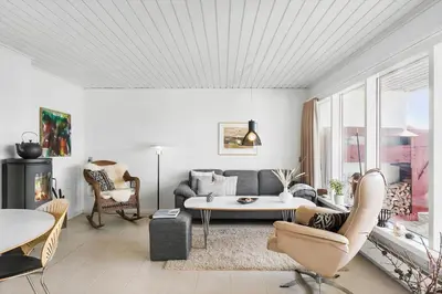 a living room with a couch and a table at BL1349-Pandrup-Rodhus-Klitvej-217 in Pandrup