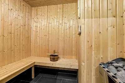 a wooden sauna with a cactus in it at LK2167-Lokken-Kringelbaekvej-12 in Løkken