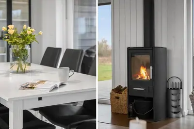 a living room with a fireplace and a table with at LK2167-Lokken-Kringelbaekvej-12 in Løkken