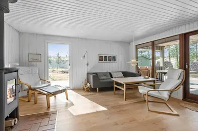 a living room with a couch and a table at BL1735-Pandrup-Rodhus-Skolevej-56 in Pandrup