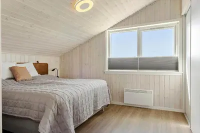 a bedroom with a bed and a window at BL1470-Saltum-Faaborgvej-6 in Saltum