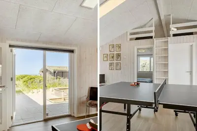 a home office with a table and a glass door at BL1470-Saltum-Faaborgvej-6 in Saltum