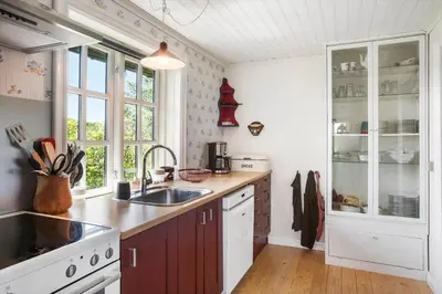 a kitchen with a sink and a counter top at BL1459-pandrup-Gl-Jacobsvej-24 in Pandrup