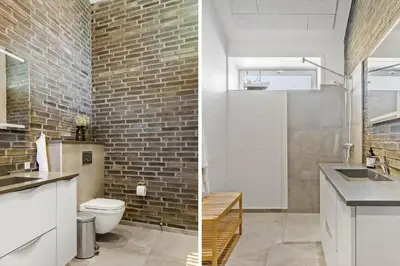 two images of a bathroom with a brick wall at BL1468-Blokhus-Moreavej-59-B in Blokhus