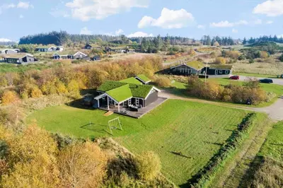 an aerial view of a house with a green roof at BL497-Saltum-Tolhoj-4 in Saltum