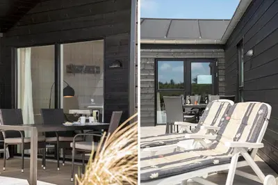 a patio with chairs and a table and a dining room at BL1481-Saltum-Kommenvej-1 in Saltum