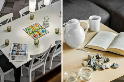 a table with a book and a vase and a table with a book at BL308-Saltum-Laustvej-24 in Saltum
