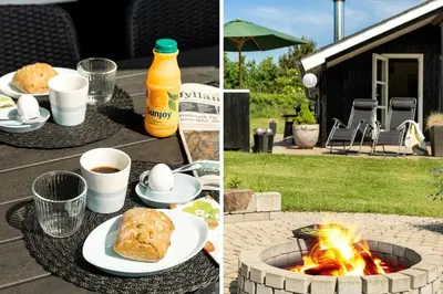 a table with food and coffee and a fire pit at BL1336-Blokhus-Berberisvej-18 in Blokhus