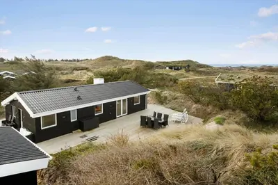 a black house in the middle of the desert at BL332-Saltum-Svendborgvej-18 in Saltum