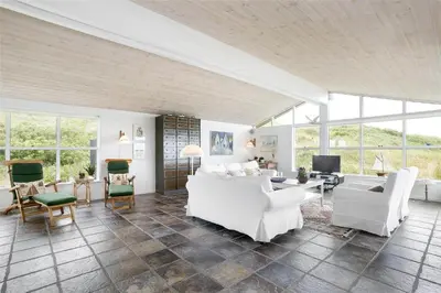 a living room with white furniture and large windows at BL216-Saltum-Svendborgvej-25 in Saltum