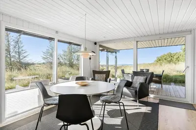 a dining room with a table and chairs at BL867-Saltum-Karen-Mariesvej-48 in Saltum