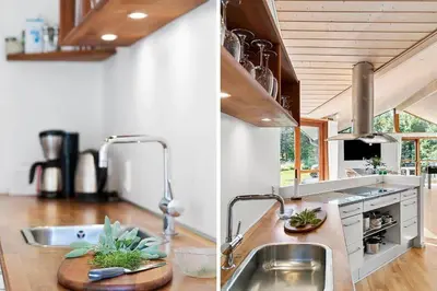 a kitchen with a sink and a counter top at BL1718-Blokhus-Ronliensvej-16 in Blokhus