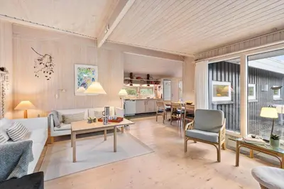 a living room with a couch and a table at BL1263-Saltum-Ornebjergvej-25 in Saltum