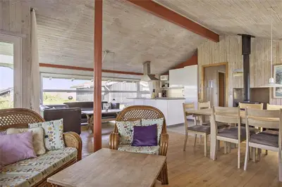 a living room with a couch and a table at BL758-Pandrup-Hunetorp-Klitvej-237 in Pandrup