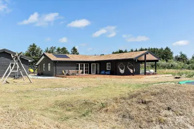 a house with a large yard in front of it at BL1559-Saltum-Nordvestvej-25 in Saltum