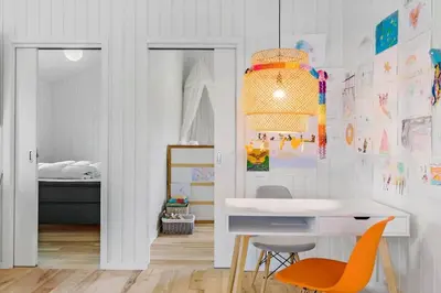 a childs bedroom with a desk and a bed at BL1559-Saltum-Nordvestvej-25 in Saltum