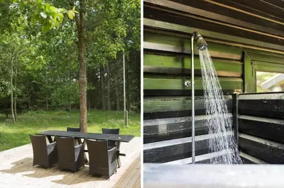 a picnic table with a shower and a bench at BL1494-Saltum-Viborgvej-6 in Saltum