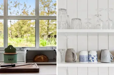 a kitchen counter with glass vases and a window at BL1082-Blokhus-Klintevej-12 in Blokhus