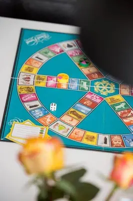 a close up of a board game on a table at BL1573-Blokhus-Soren-Tjenersvej-3 in Blokhus