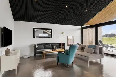 a living room with a couch and a table at BL1364-Saltum-Tolhoj-34 in Saltum