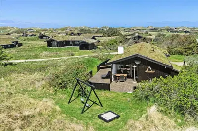 an overhead view of a house with a grass roof at BL411-Pandrup-Hunetorp-Klitvej-223 in Pandrup