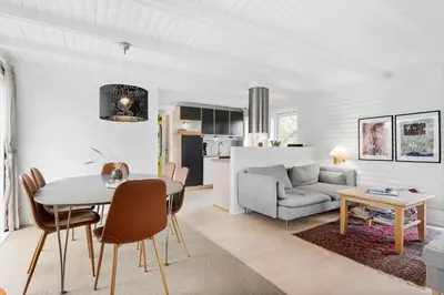 a living room with a table and a couch at BL1314-Pandrup-Nordvej-11 in Pandrup