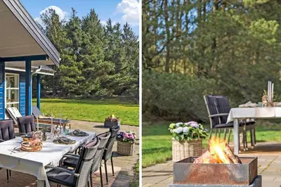 a patio with a table and a fire pit at BL1328-Saltum-Kvanbaekvej-33 in Saltum