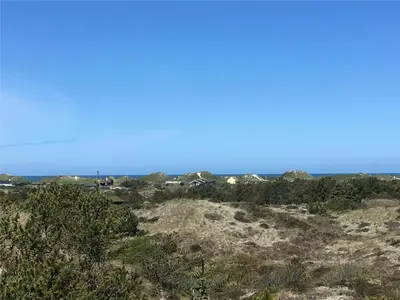 a view of the ocean from the top of a hill at BL1473-Pandrup-Lommelaerken-14 in Pandrup