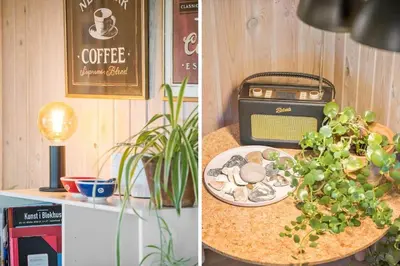 a table with a plate of food and a radio at BL709-Blokhus-Kr-Thomsensvej-5 in Blokhus