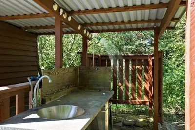 a sink on a deck with a pergola at BL1727-Pandrup-Lunekrogen-16 in Pandrup