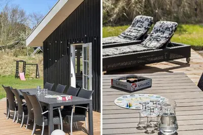 a patio with a table and chairs and a grill at BL1639-Blokhus-Bloksbjerg-57 in Blokhus