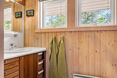 a bathroom with a sink and a towel rack at BL410-Saltum-Store-Fiskerbanke-4 in Saltum