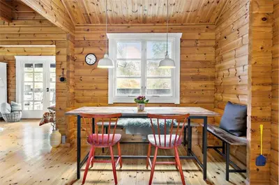 a dining room with a table and two chairs at BL1610-Blokhus-Soren-Petersvej-20 in Blokhus