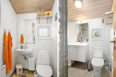 a bathroom with a toilet and a sink at BL1394-Pandrup-Tunen-2 in Pandrup