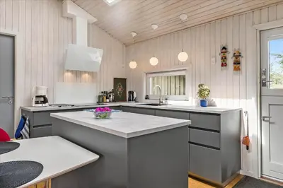 a kitchen with a sink and a counter top at BL173-Blokhus-Bloksbjerg-88 in Blokhus