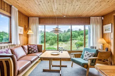 a living room with a couch and a table at BL1568-Saltum-P-Ejerstedgaardsvej-1-A in Saltum