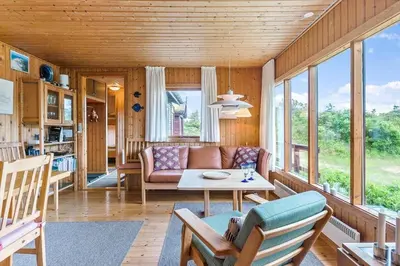 a living room with a couch and a table at BL1568-Saltum-P-Ejerstedgaardsvej-1-A in Saltum